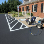 ADA-accessible parking space and diagonal no-parking zone freshly striped by Davis Line Striping in Pottstown, PA. Handicap-accessible line striping and no-parking zone freshly painted in Pottstown, PA