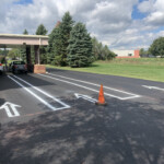 Fresh drive-through lane striping with directional arrows completed at a Pottstown, PA bank by Davis Line Striping. Drive-through lane striping and directional arrows at a bank in Pottstown, PA