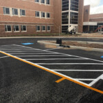 Clearly marked accessible parking spaces with high-contrast striping installed by Davis Line Striping in Pottstown, PA. ADA-compliant parking lot striping at commercial building in Pottstown, PA